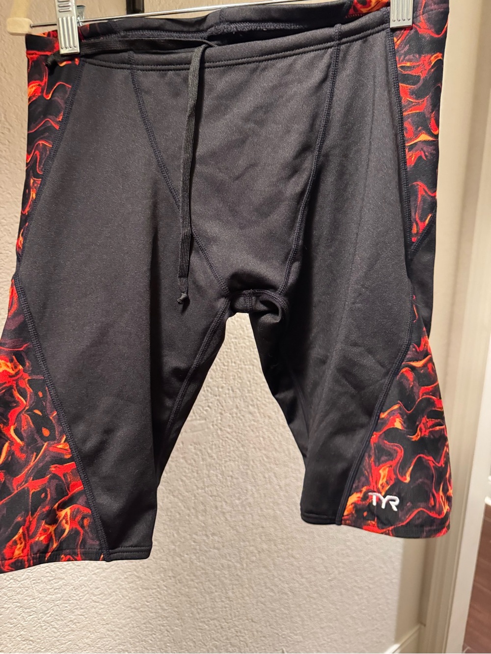 TYR Men’s Black Swim Shorts with Red Flame Side Panels